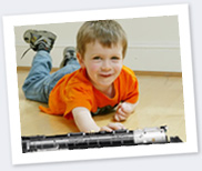 Child enjoying a Lionel train